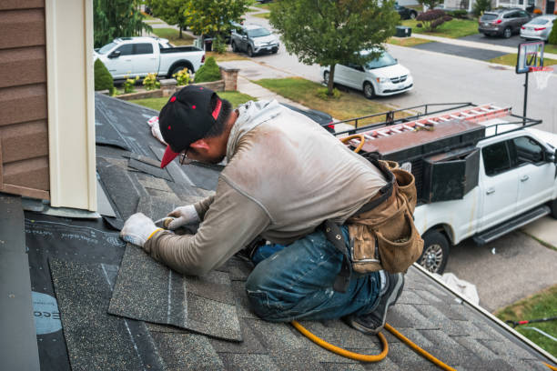 Professional Gutter Installation technician working in Madison, IL